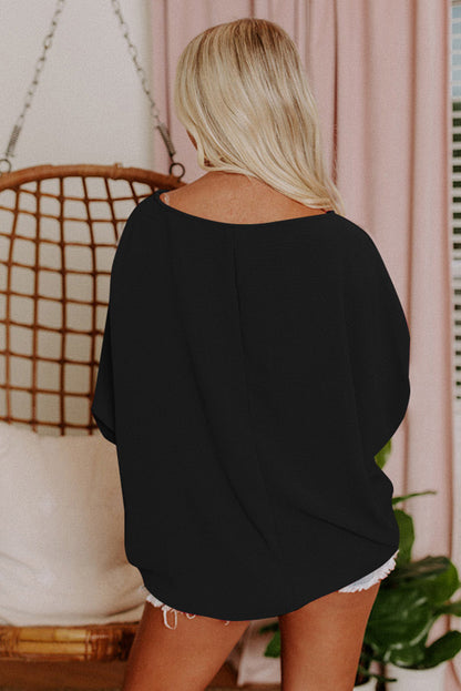 Black Smocked Wrist Shift Top